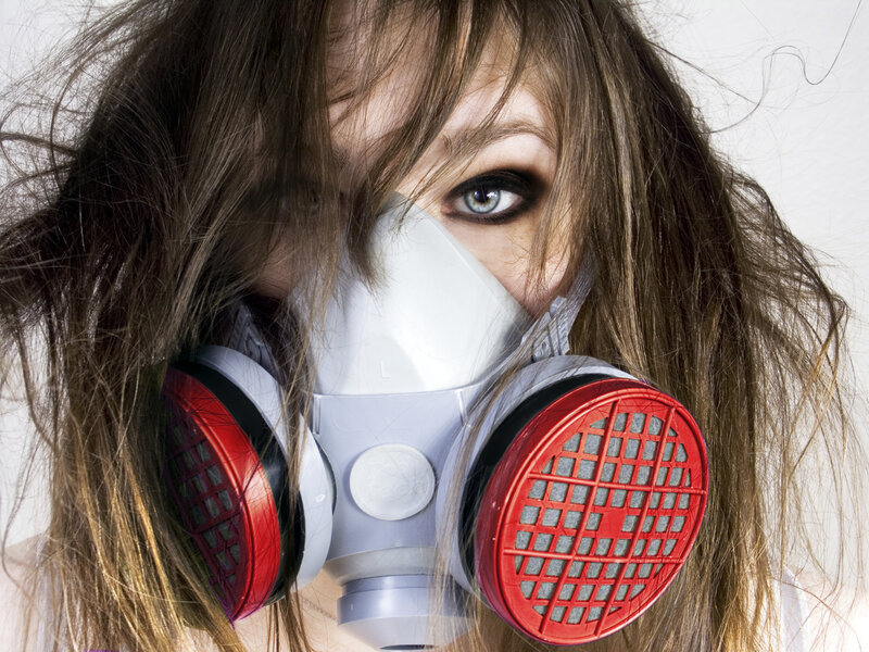 woman wearing gas mask
