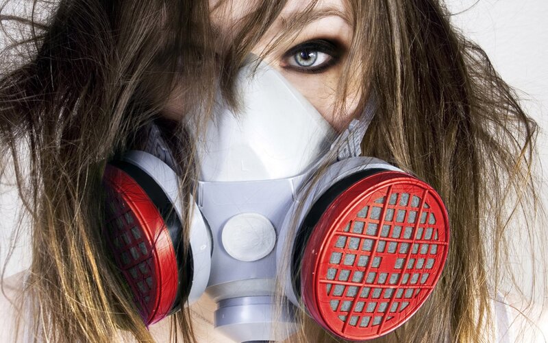 woman wearing gas mask