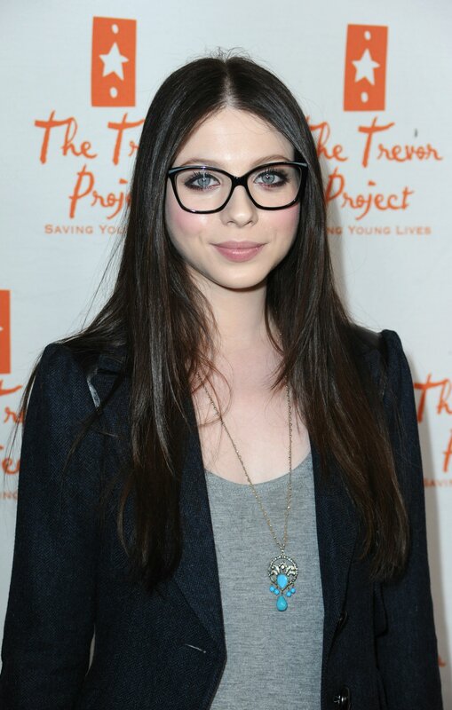 woman wearing glasses at event