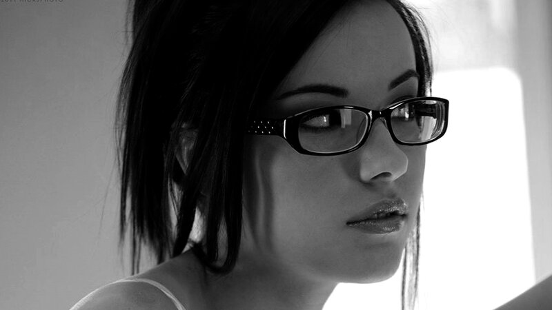 Woman Wearing Glasses — Black, Dramatic, Photograph