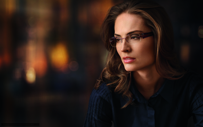 Woman Wearing Glasses — Brown, Dramatic