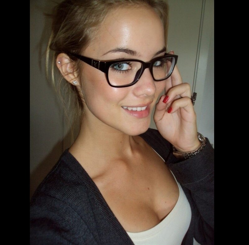 woman wearing glasses smiling