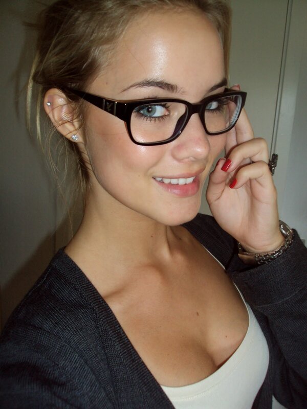woman wearing glasses smiling