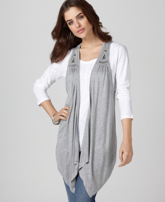 woman wearing gray vest