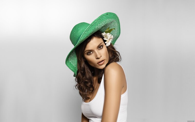 Woman Wearing Green Hat — Neutral