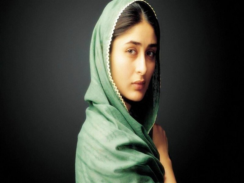 Woman Wearing Green Headscarf — Serious