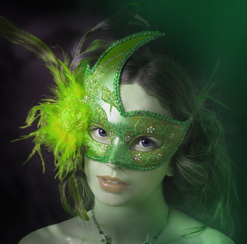 Woman Wearing Green Mask — Dramatic