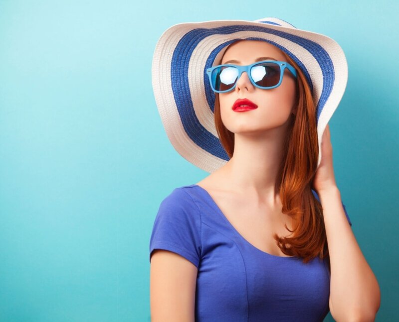 Woman Wearing Hat and Sunglasses — Blue