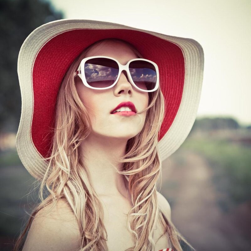 Woman Wearing Hat and Sunglasses — Red