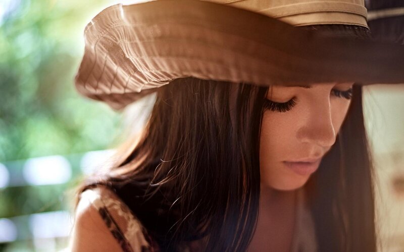 Woman Wearing Hat — Brown, Contemplative