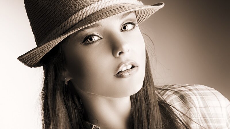 Woman Wearing Hat — Brown, Dramatic, Photograph, Plaid Shirt