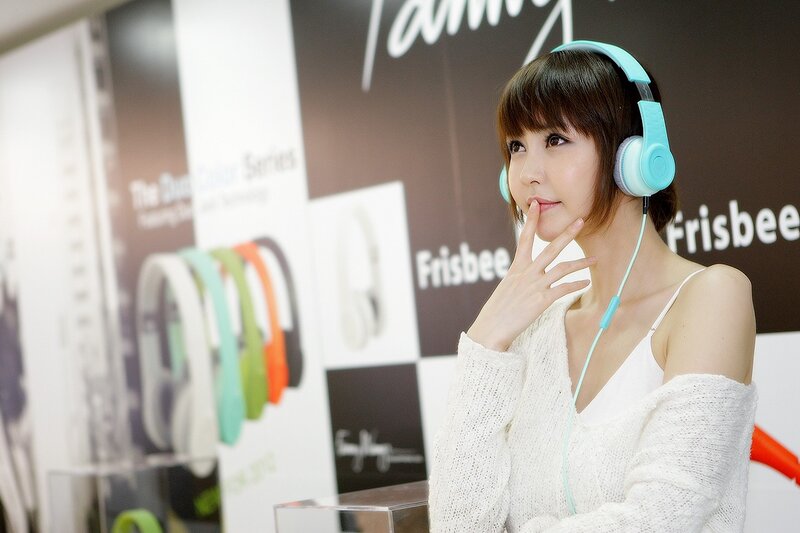 woman wearing headphones at event