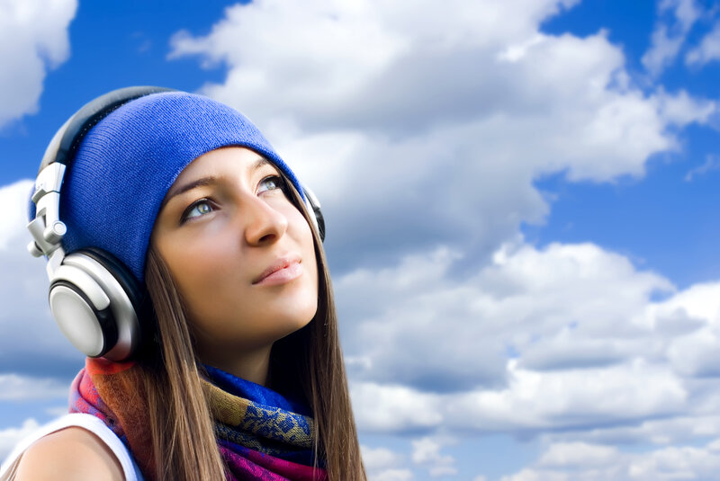 Woman Wearing Headphones — Blue, Serene, Afternoon