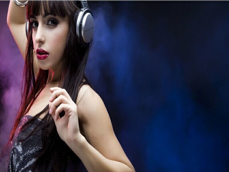 Woman Wearing Headphones — Blue