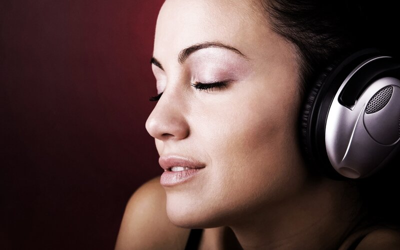 Woman Wearing Headphones — Maroon