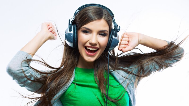 Woman Wearing Headphones — White, Energetic, Photograph