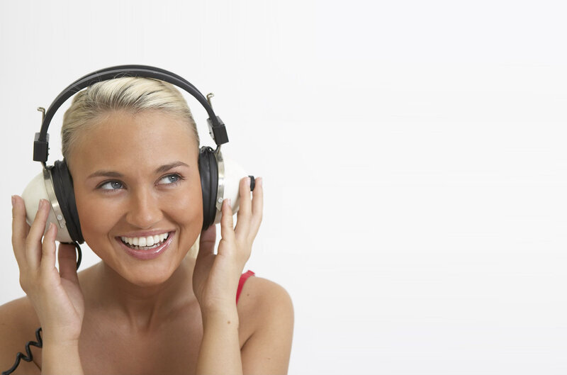 Woman Wearing Headphones — White, Happy, Photograph