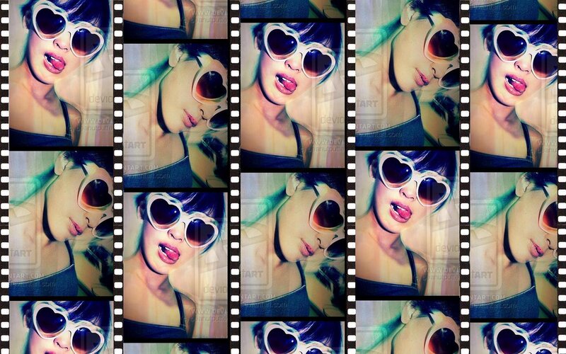Woman Wearing Heart-shaped Sunglasses