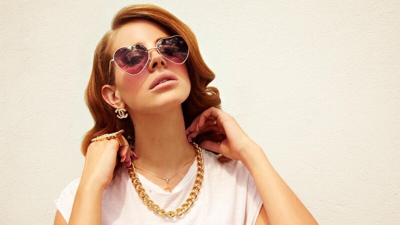 woman wearing heart sunglasses