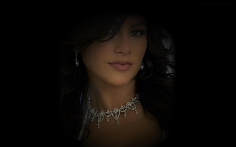 Woman Wearing Jewelry — Black, Dramatic