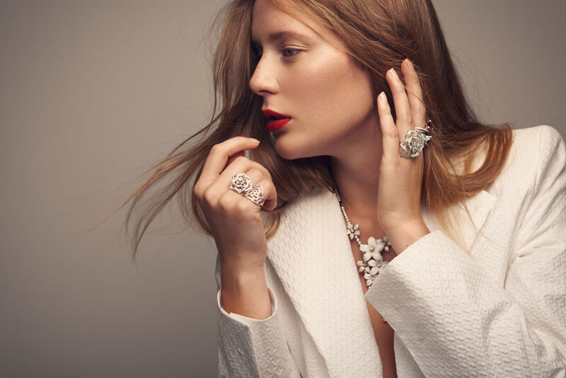 Woman Wearing Jewelry — White, Dramatic