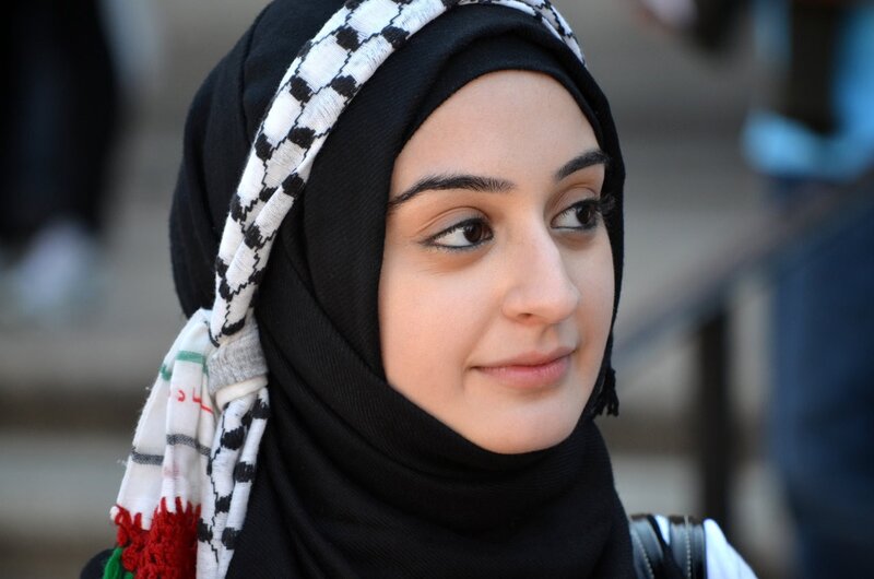 woman wearing keffiyeh headscarf
