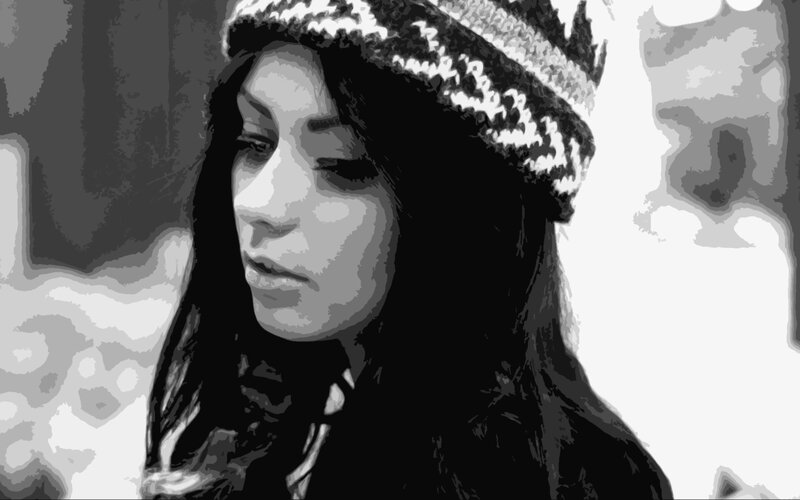 Woman Wearing Knit Hat — Black