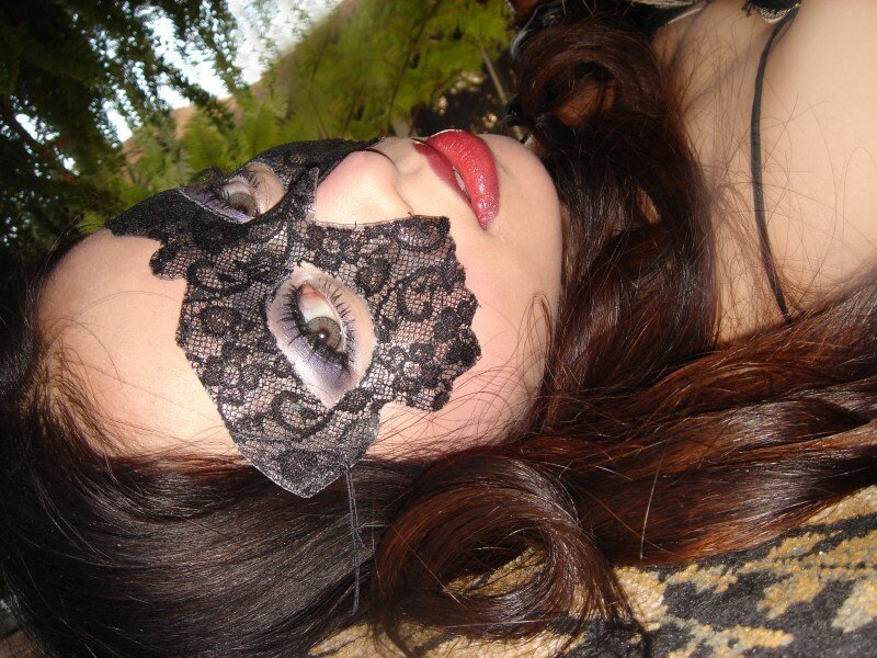 Woman Wearing Lace Mask