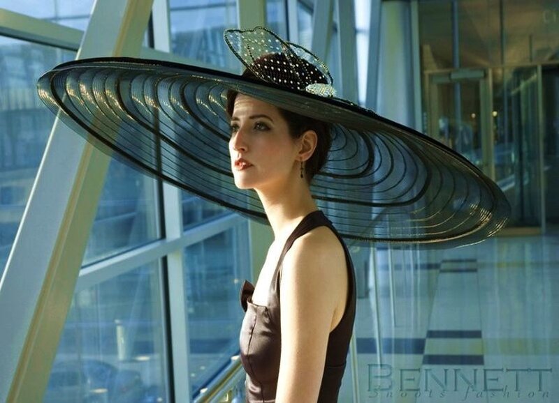 Woman Wearing Large Hat — Black