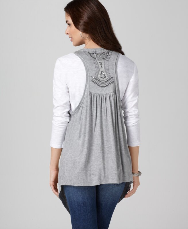 woman wearing layered tops