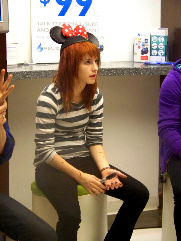woman wearing minnie mouse ears