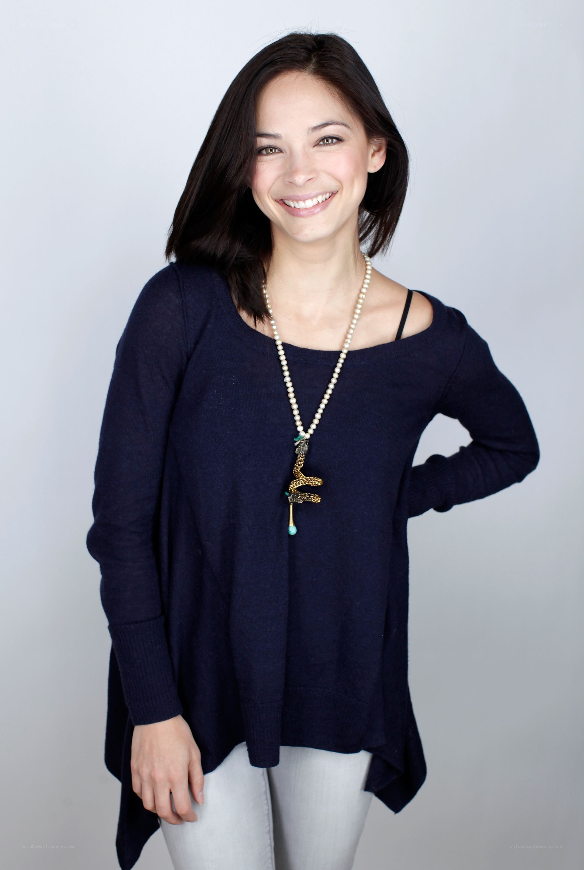 woman wearing navy sweater