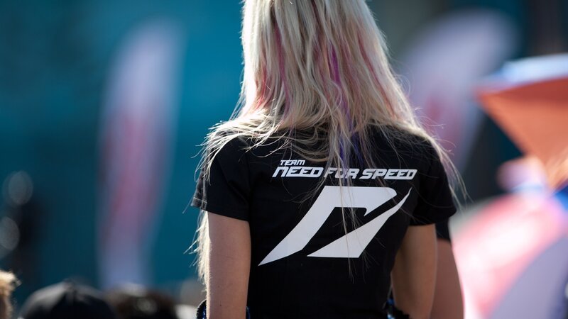 Woman wearing Need for Speed shirt