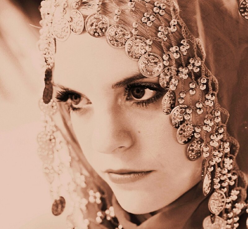 Woman Wearing Ornate Headpiece