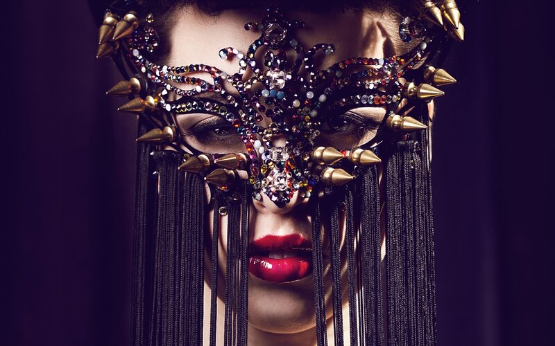 Woman Wearing Ornate Mask