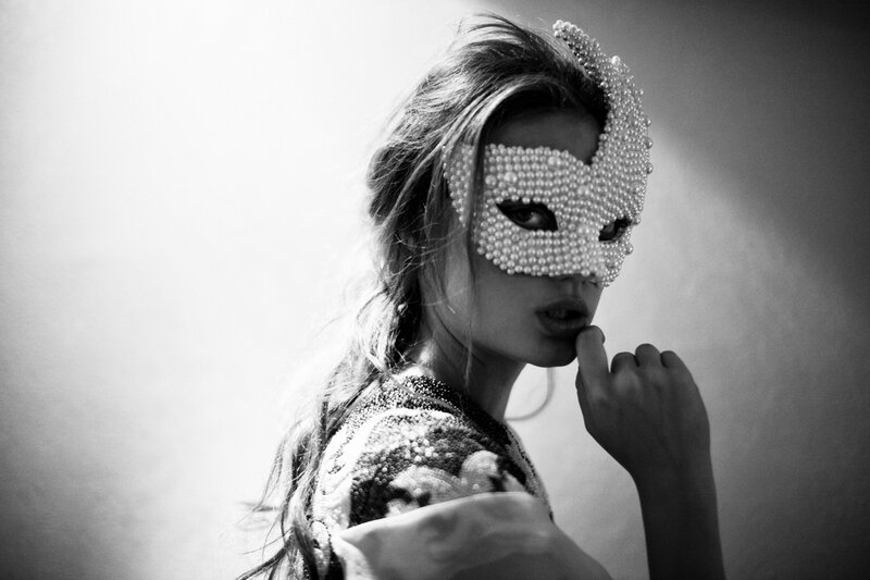 Woman Wearing Pearl Mask
