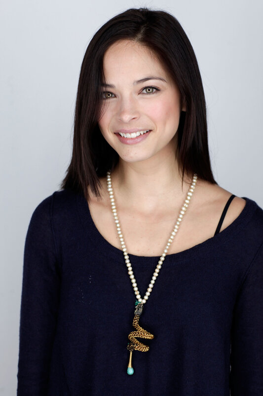 woman wearing pearl necklace