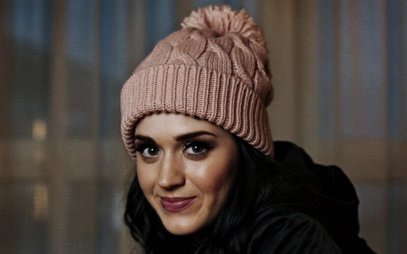 woman wearing pink beanie