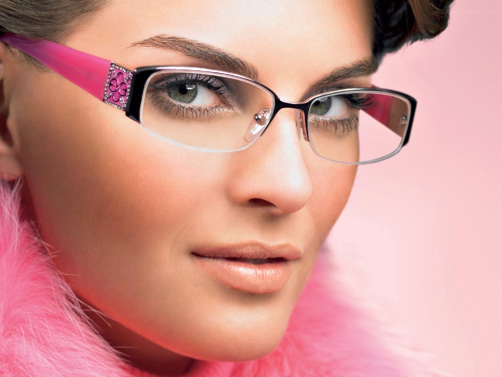 woman wearing pink glasses