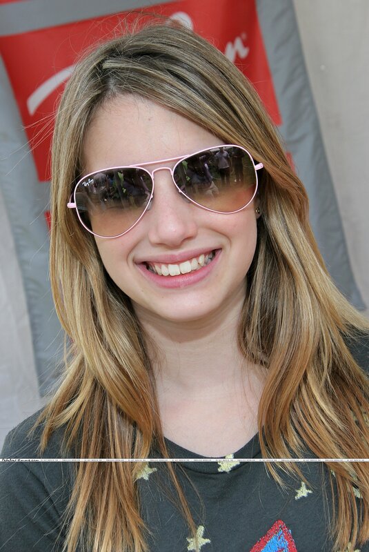 woman wearing pink sunglasses