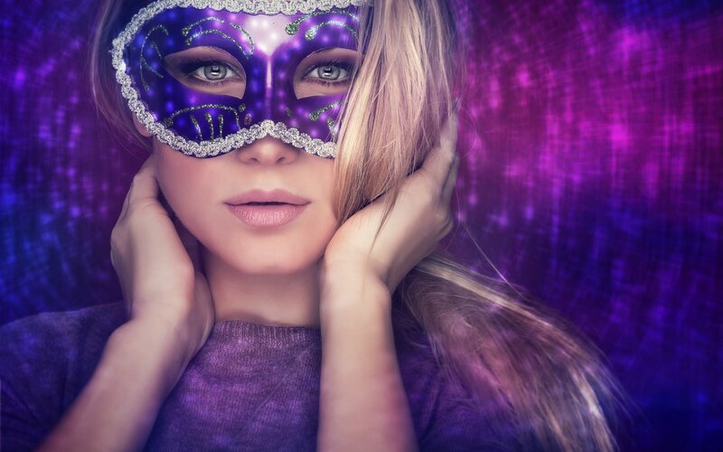 Woman Wearing Purple Mask — Dramatic