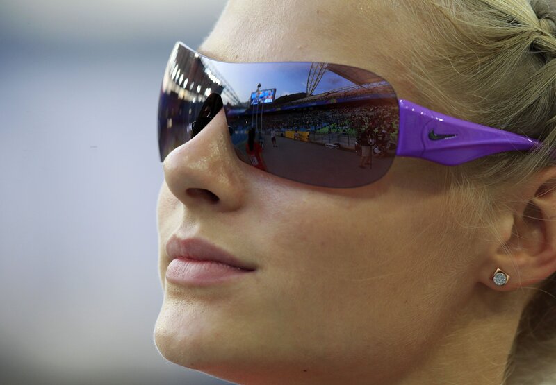 woman wearing purple sunglasses