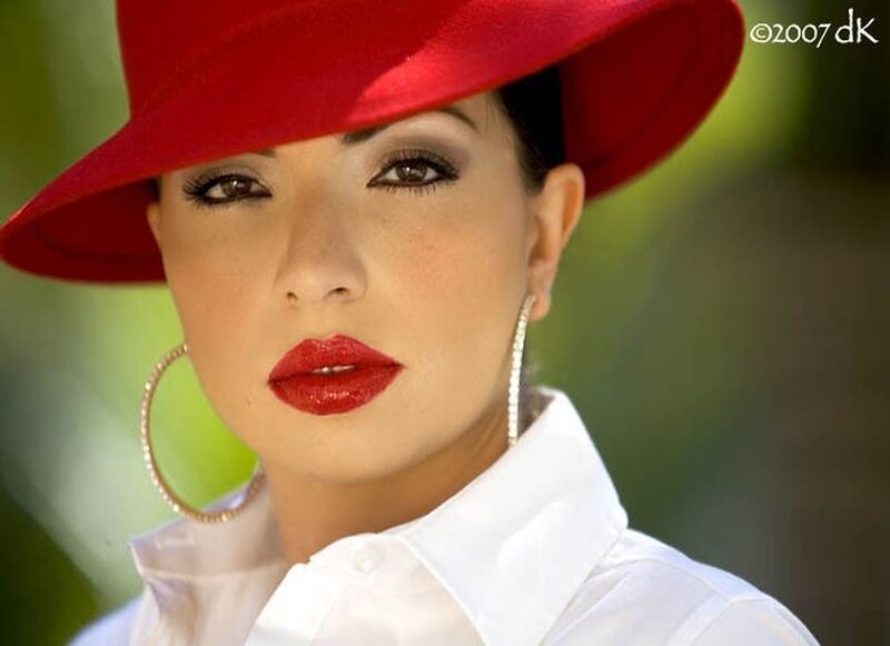 Woman Wearing Red Hat — Confident
