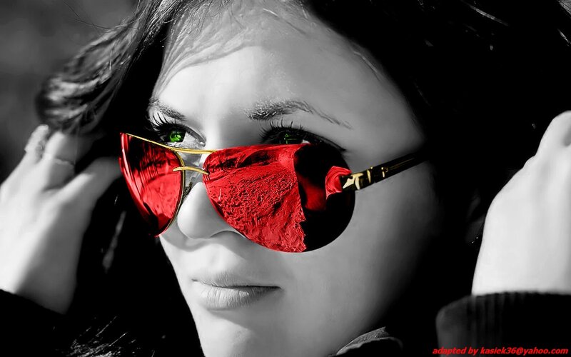 Woman Wearing Red Sunglasses — Dramatic