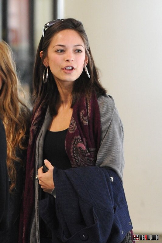woman wearing scarf and coat