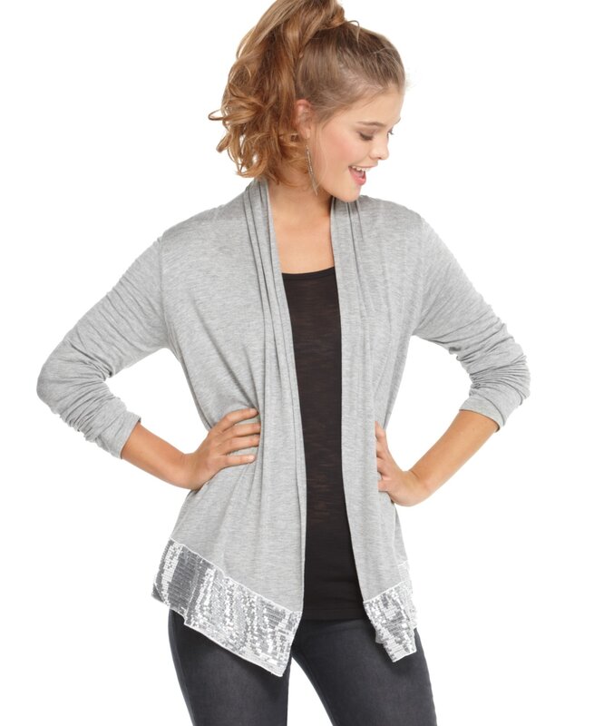 woman wearing sequin cardigan