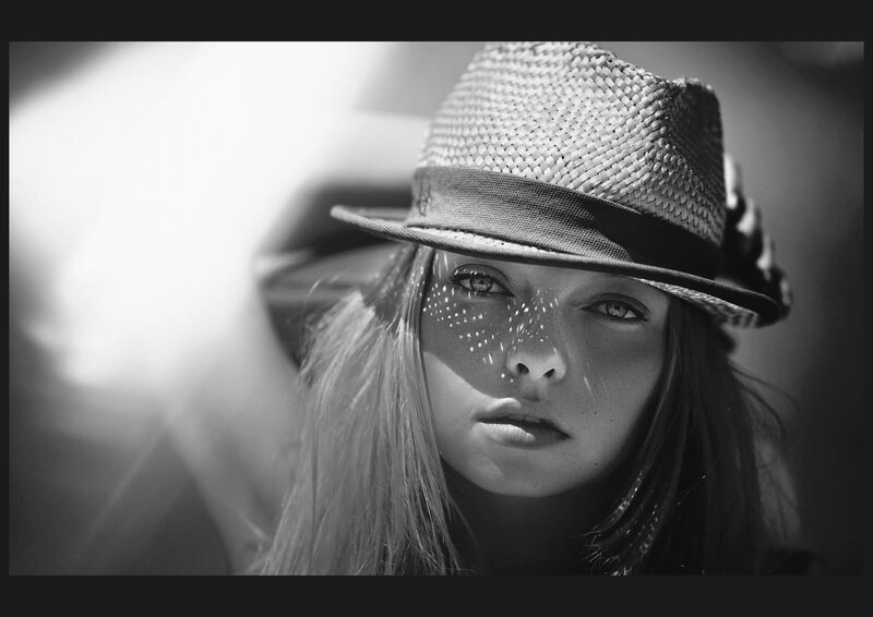 Woman Wearing Straw Hat — Black, Dramatic, Afternoon