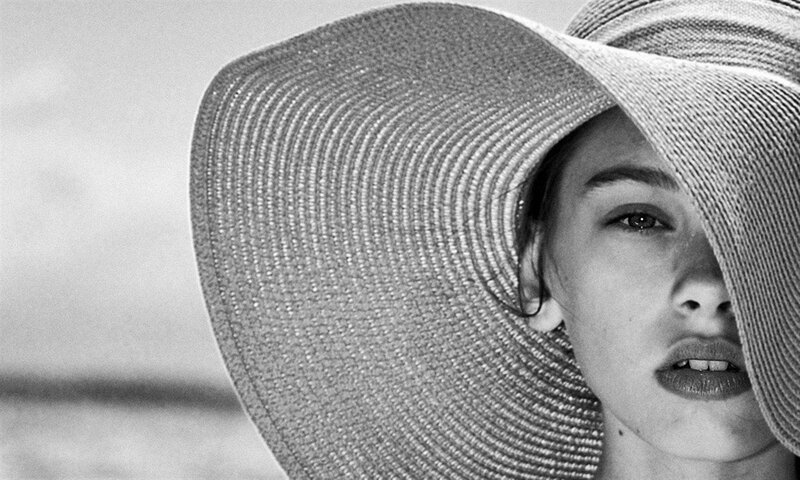 Woman Wearing Straw Hat — Black, Dramatic, Photograph, Straw Hat