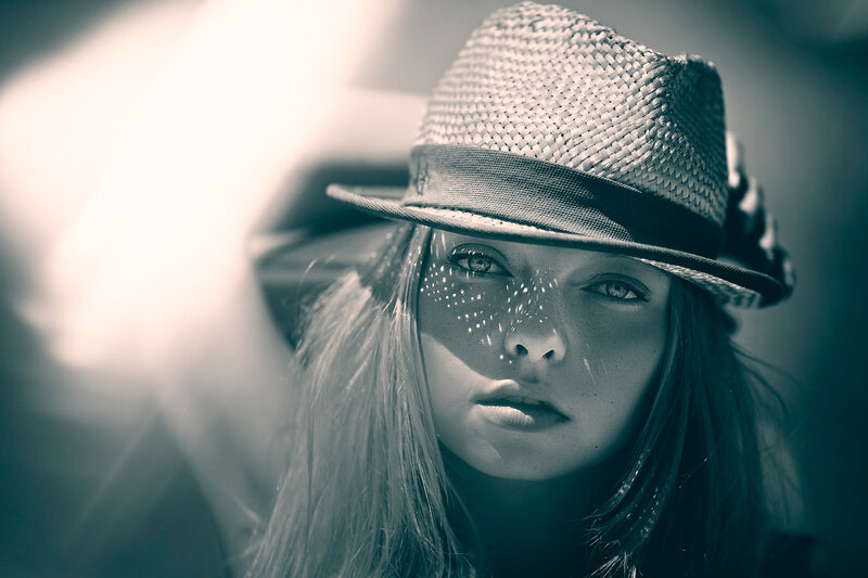 Woman Wearing Straw Hat — Black, Dramatic, Photograph, Sunlight