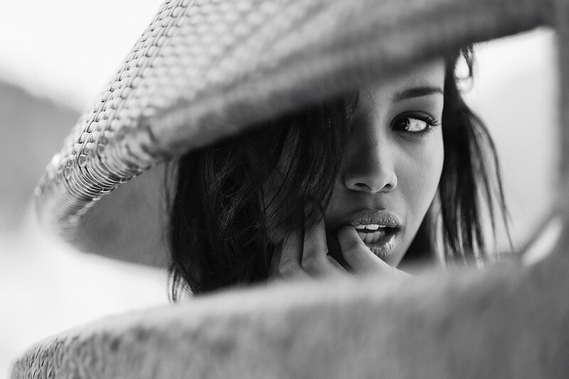 Woman Wearing Straw Hat — Black, Dramatic
